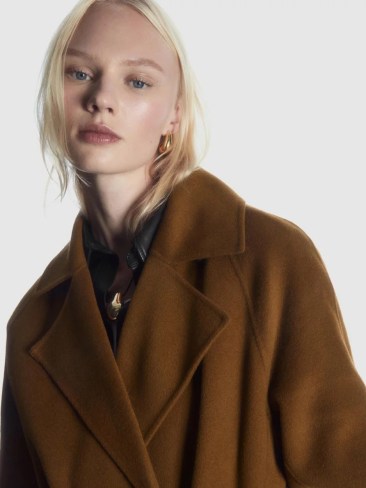 COS Belted Double-Faced Wool Coat. Picture: THE ICONIC.