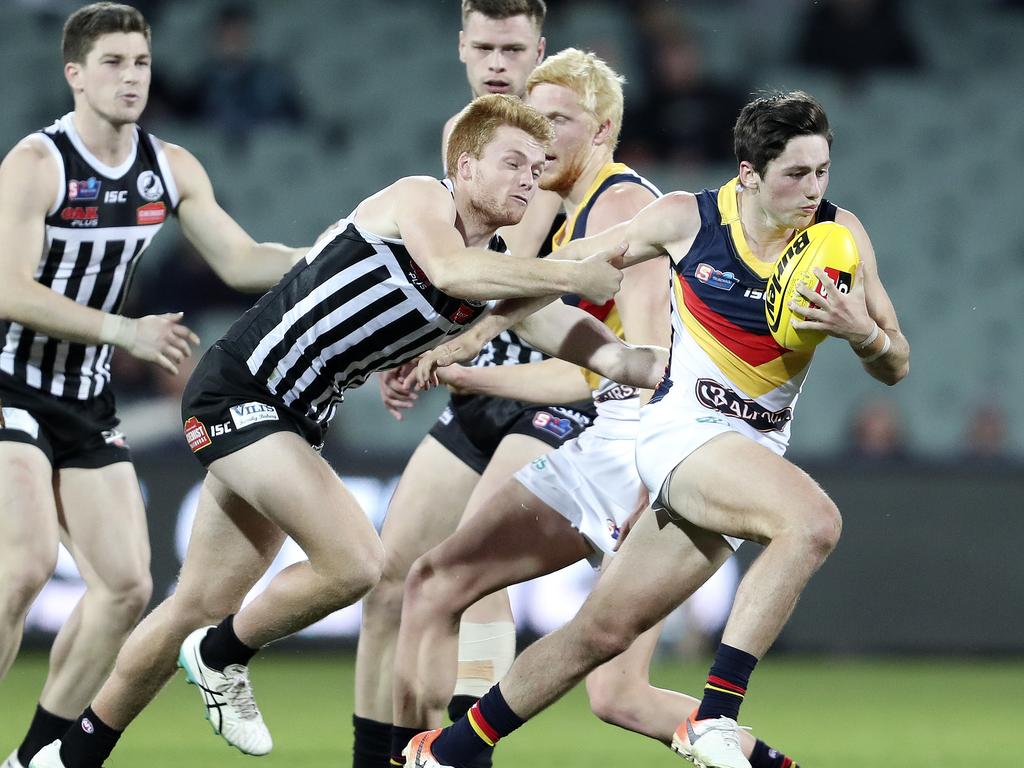 SANFL - QUALIFYING FINAL - Port Adelaide Magpies v Adelaide Crows  at Adelaide Oval. Chayce Jones and Willem Drew Picture SARAH REED