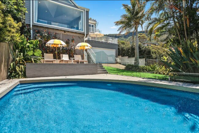 This property has guests set for a splash in the pool or taking in the sun. Picture: Airbnb