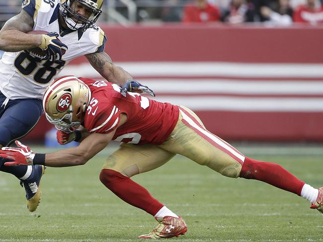 49ers’ safety Eric Reid said players “loved” Jim Tomsula.