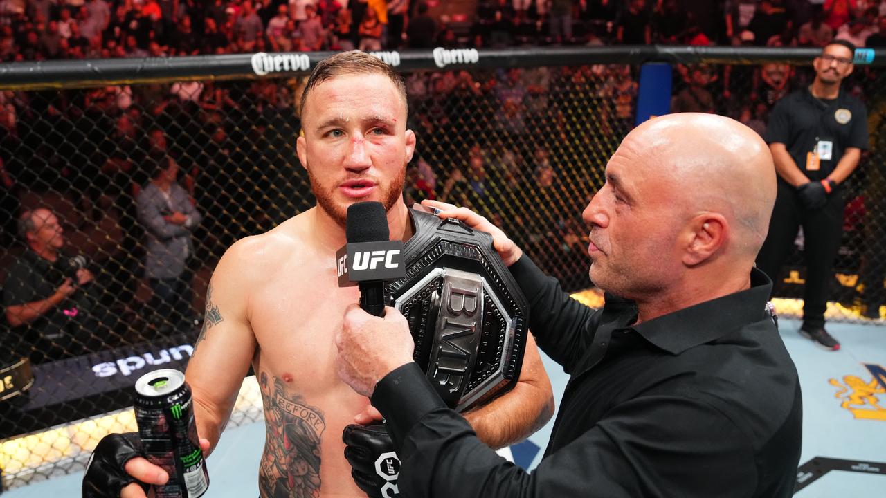 Rogan regularly conducts post-fight interviews in the Octagon. (Photo by Josh Hedges/Zuffa LLC via Getty Images)