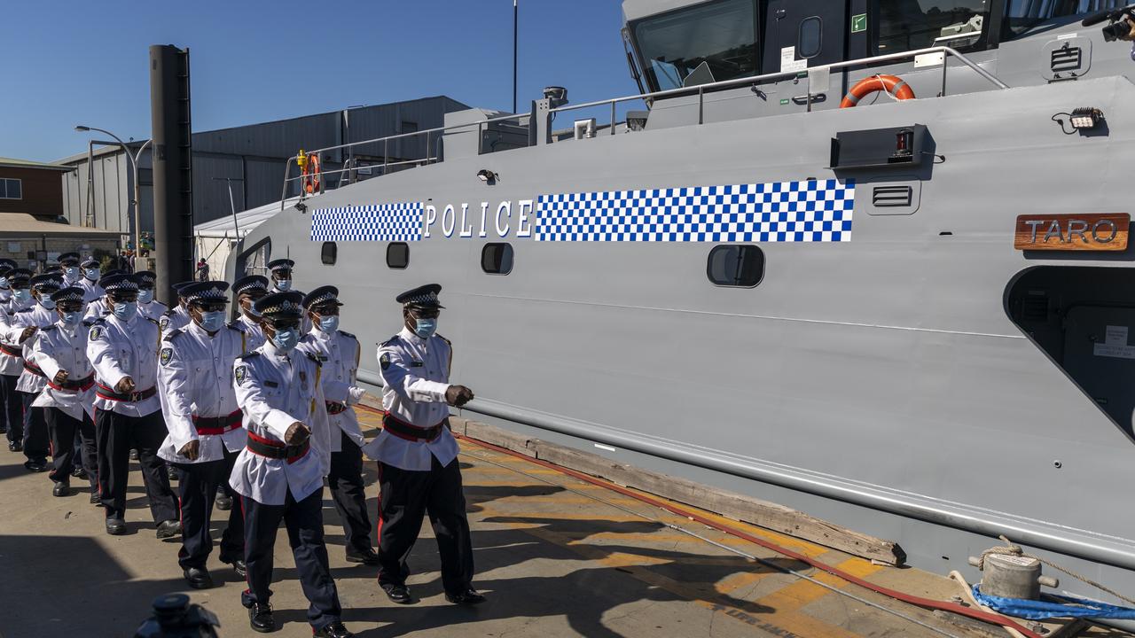 The ship’s company of Royal Solomon Islands Patrol Vessel Taro march along the wharf at AUSTAL Ship Building Facility in Henderson, Western Australia, to board their vessel for the first time on completion of the vessel’s handover.