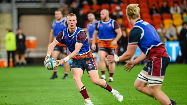Mason Gordon in pre-game warm-ups before his Queensland Reds debut against Wales in 2024. Picture: Stephen Tremain