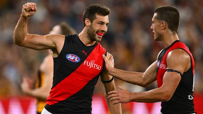 Kyle Langford celebrates a goal for Essendon.