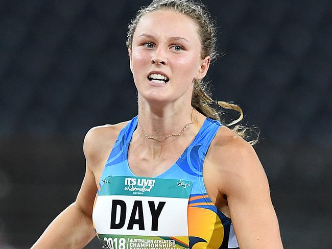 Riley Day of Queensland crosses the line to win the Womens 100m Final at the Australian Athletics Championships competition on the Gold Coast, Friday, February 16, 2018. (AAP Image/Dave Hunt) NO ARCHIVING