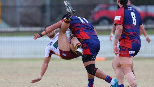 Samuel Kimi Ioane with a strong tackle for Campbelltown Collegians on Thirlmere’s Tim Simona. Picture: Steve Montgomery