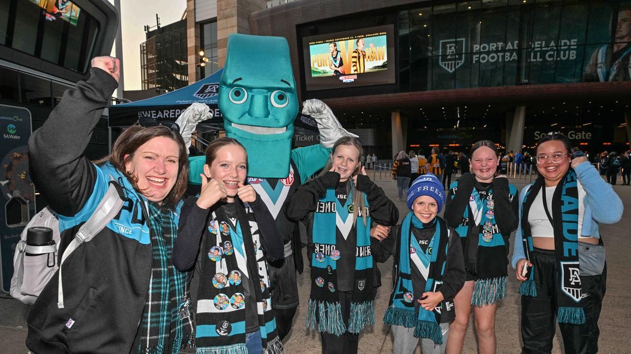 SEPTEMBER 13, 2024: Fans with the Power mascot arriving for the Port v Hawthorn semi final at Adelaide Oval. Picture: Brenton Edwards