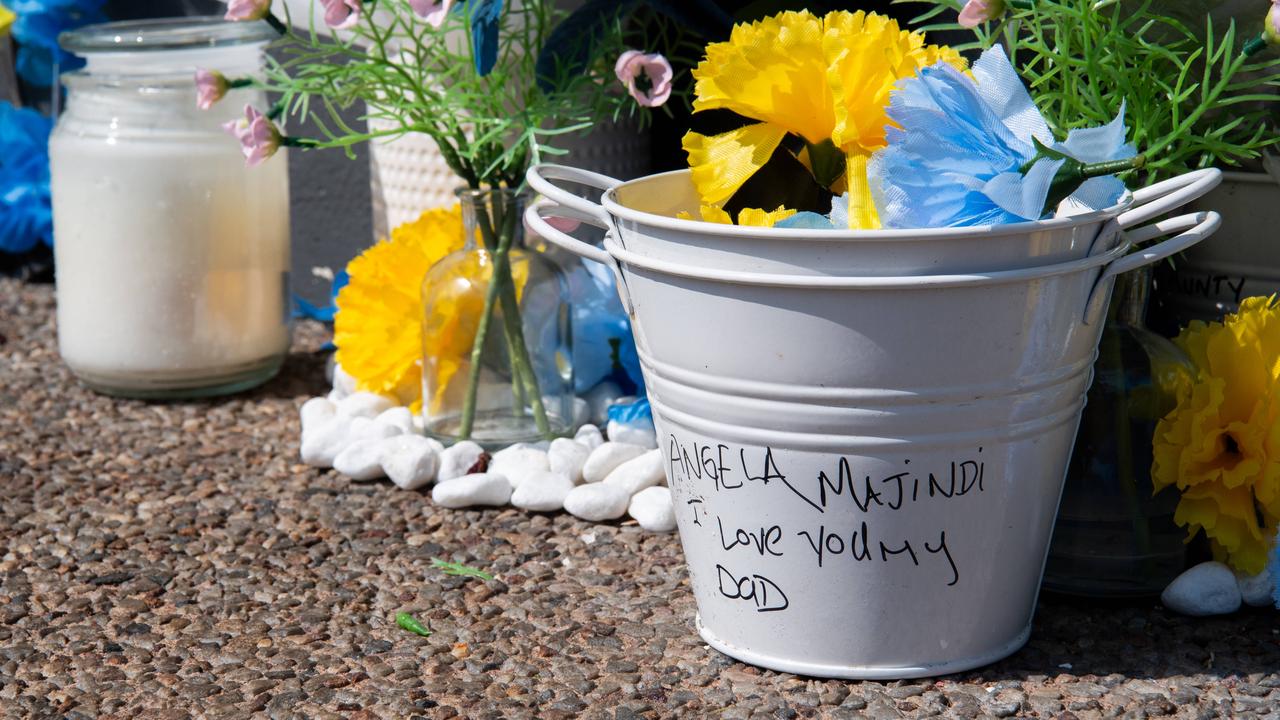 A memorial has been set up at the scene of a fatal stabbing of a 36-year-old Wadeye man outside the Cavenagh Street Woolworths supermarket on Saturday, September 16. Picture: Pema Tamang Pakhrin