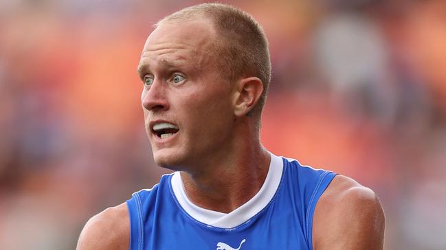 SYDNEY, AUSTRALIA - MARCH 16: Jaidyn Stephenson of the Kangaroos runs the ball during the round one AFL match between Greater Western Sydney Giants and North Melbourne Kangaroos at ENGIE Stadium on March 16, 2024 in Sydney, Australia. (Photo by Jason McCawley/AFL Photos/via Getty Images )