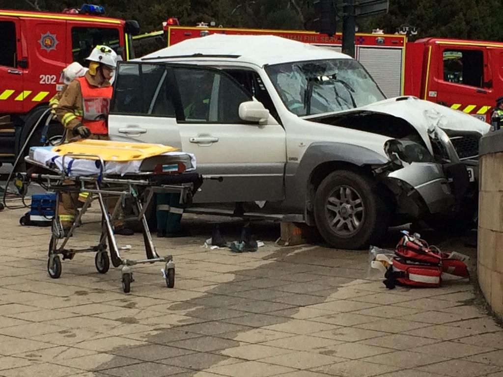 Rescuers at the scene of a horror smash at the bottom of the freeway. Picture: Sam Kelton