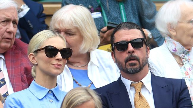 LONDON, ENGLAND - JULY 02: Musician, Dave Grohl, and his wife Jordyn Grohl are seen in the Royal Box ahead of the Ladies' Singles first round match between Jessica Bouzas Maneiro of Spain and VONduring day two of The Championships Wimbledon 2024 at All England Lawn Tennis and Croquet Club on July 02, 2024 in London, England. (Photo by Sean M. Haffey/Getty Images)