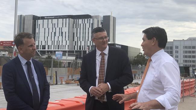 Transport Minister Andrew Constance, Seven Hills MP Mark Taylor and Parramatta MP Geoff Lee, at Westmead in November when Mr Constance cast more doubt on extending stage two of the light rail.