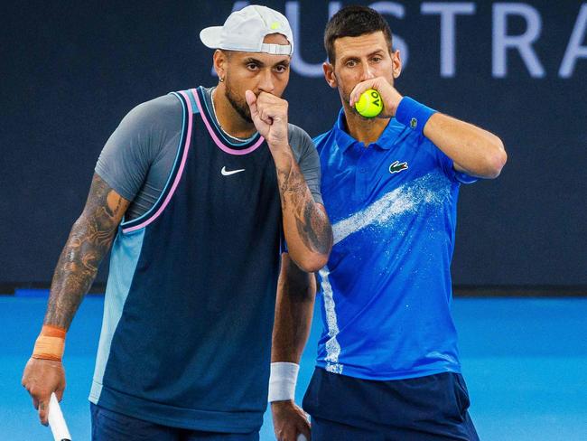 Novak Djokovic (right) says Nick Kyrgios is right in claiming tennis players aren’t paid enough. Picture: AFP