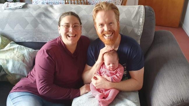 Matthew Moon became one of the first Australians to receive the Pfizer COVID-19 vaccine. Pictured with his partner Katie Crookes and their son Artie. Picture: Supplied