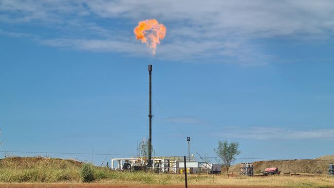 Methane is burnt off at a Santos well site on Tanumbirini Station.