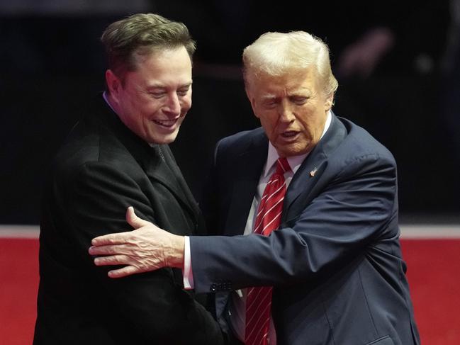 Elon Musk, left, and President-elect Donald Trump embrace as they look at Musk's son X Ãâ  A-Xii at a rally ahead of the 60th Presidential Inauguration, Sunday, Jan. 19, 2025, in Washington. (AP Photo/Alex Brandon)