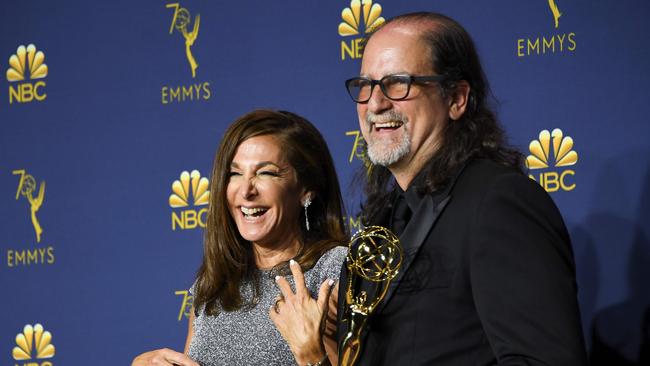 Glenn Weiss and fiancee Jan Svendsen pose with his Emmy. Picture: Valerie Macon/AFP