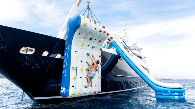 Mischief’s inflated rock-climbing wall and giant slide offer kids plenty of fun.