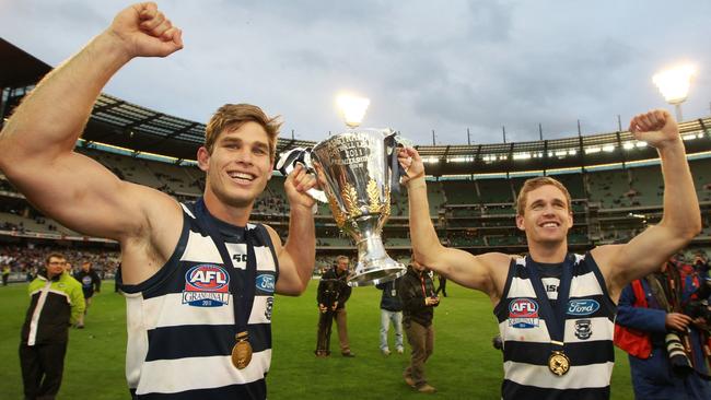 Tom Hawkins and Joel Selwood after the 2011 Grand Final.