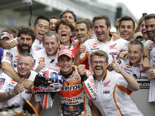 Marquez and Honda crew celebrate victory.