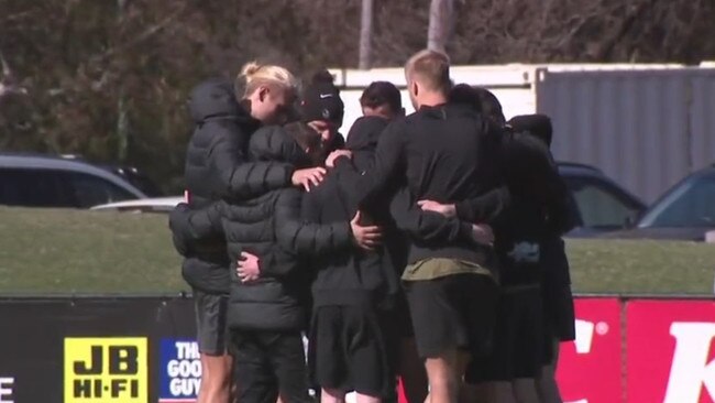 Noble's teammates got around him after the news. Photo: Channel 9