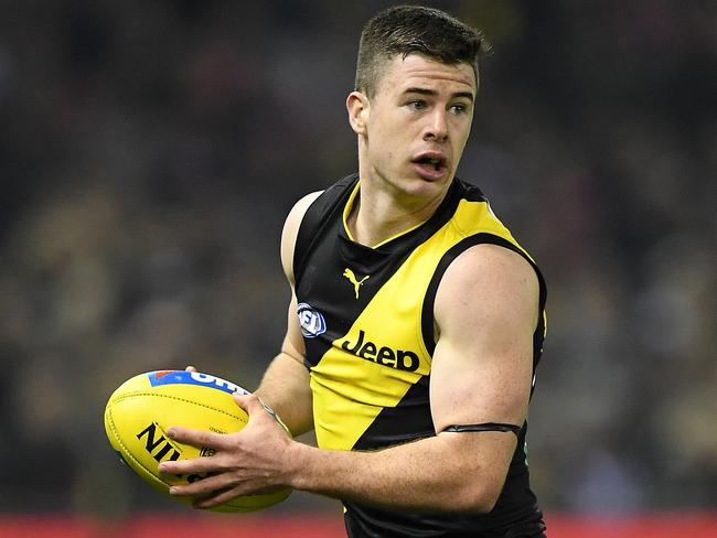 Jack Higgins of the Tigers in action during the Tigers’ win against the Swans.