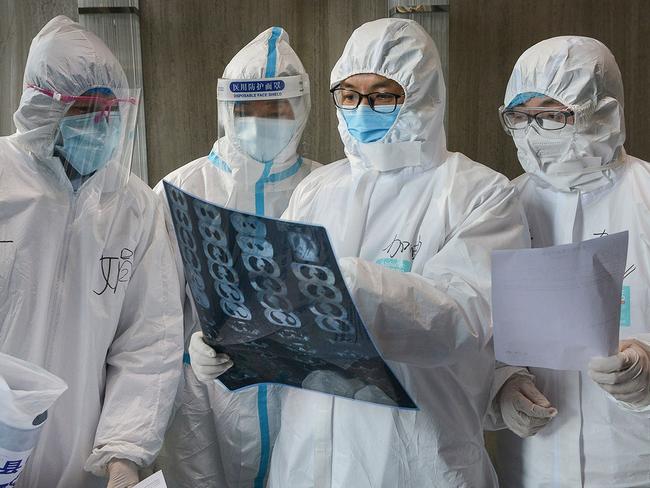 High school students stranded in China due to coronavirus can apply for a travel ban exemption. Picture: STR/AFP