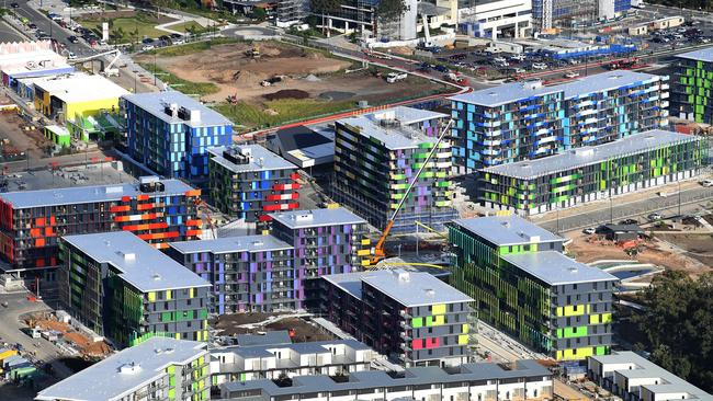 The Athletes Village on the Gold Coast at Parklands won’t be affected by building firm and site subcontractor Ware Building going into administration, says site developer Grocon. AAP Image/Dave Hunt