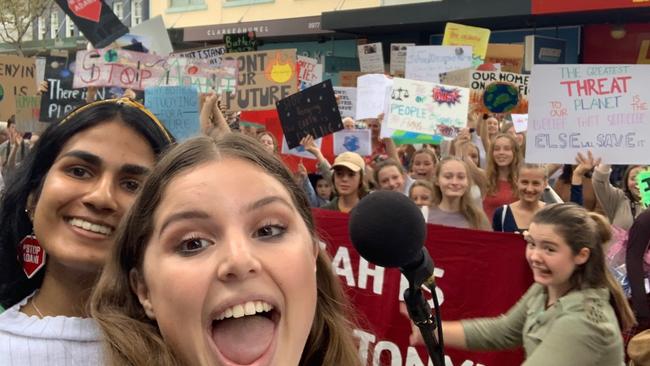 Two of the organisers take a selfie with 400 protesters. Eliza Lo Russo, 15, of Freshwater, from Manly Selective, right, and Varsha Yajman, 16, of Gosford High School, left.