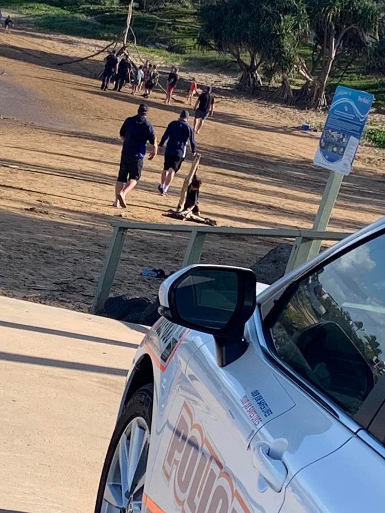 Police were called to a group of children building a structure on Bargara beach, but police responded kindly to the little engineers.