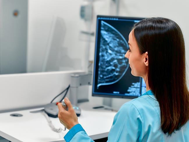 In the hospital, the patient undergoes a screening procedure for a mammogram, which is performed by a mammogram. A modern technologically advanced clinic with professional doctors.