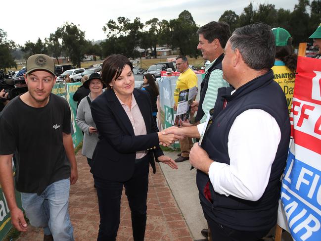 Opposition leader Jodi McKay shakes Deputy Premier John Barilaro's hand at Muswellbrook Sports Centre. Picture: NCA NewsWire / Peter Lorimer.