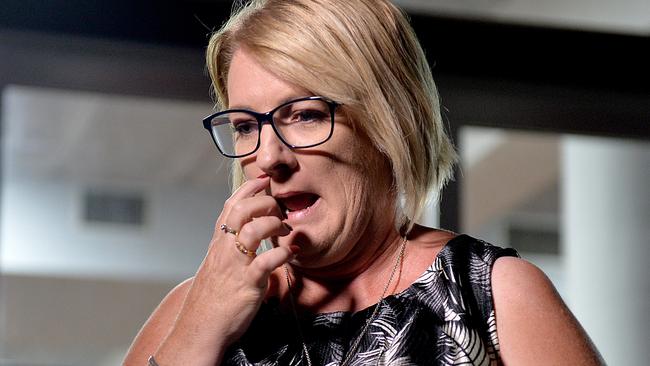 Labor Member for Mundingburra, Coralee O'Rourke sits outside the Labor Party gathering waiting for the Live Cross to ABC