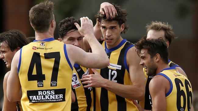 Sandringham players congratulate Max King after his first VFL goal.