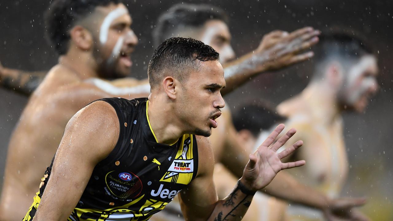 Tiger Sydney Stack joins the pre-game ceremony at the 2019 Dreamtime at the G match.