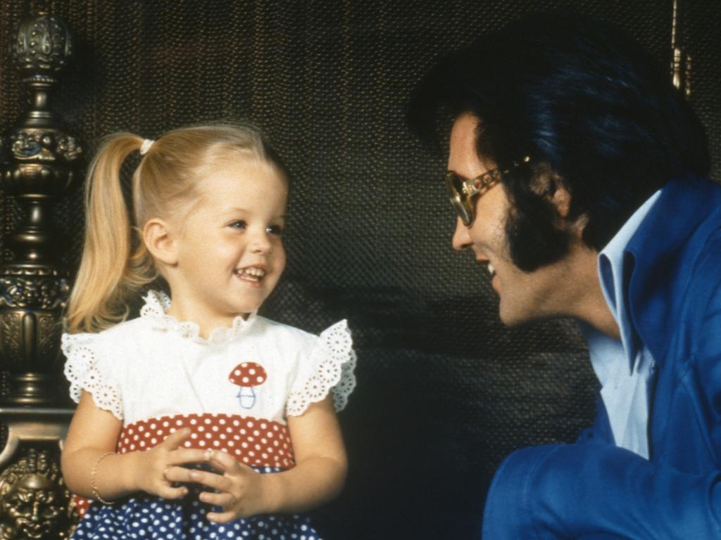 Elvis Presley with Lisa-Marie.