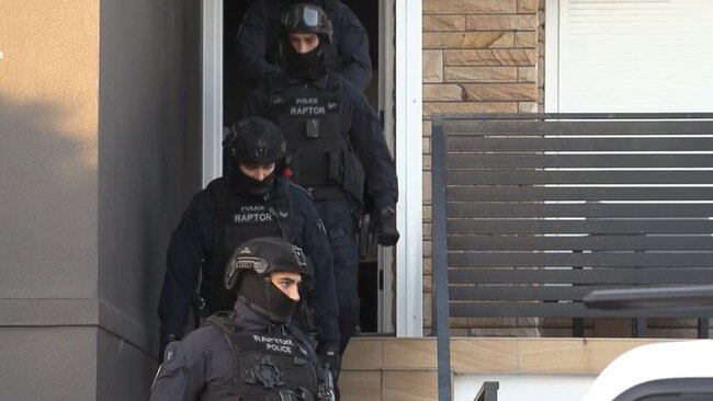 Police raid the Greystanes home in December. Picture: NSW Police