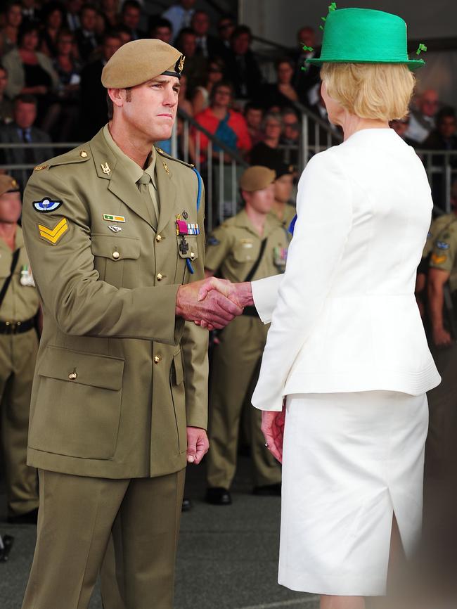 Roberts-Smith receiving his Victoria Cross from then governor-general Quentin Bryce in 2011. Picture: AAP