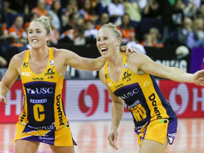 Laura Scherian and Laura Langman of the Lightning celebrates their teams win in the Super Netball Grand Final.