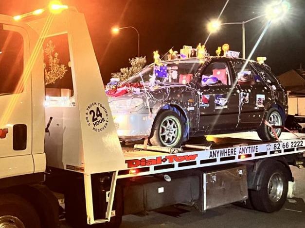 A man will face court after driving his Christmas-themed car through Henley Square.