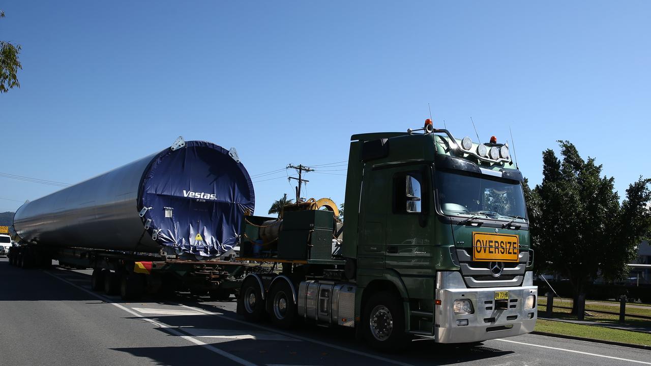 Heavy machinery transporting large metal cylinders for a wind turbine. Picture: Brendan Radke