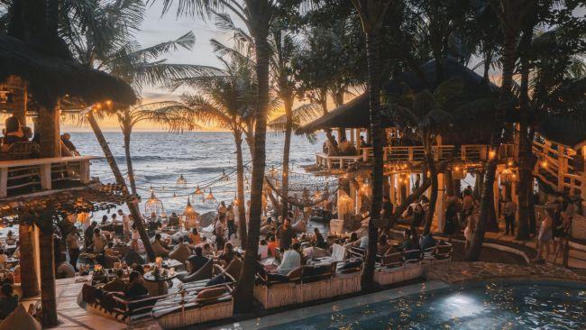 Watch the sun set at La BrisaBali abounds with beach clubs but the one that takes the prize every time for us is La Brisa on Echo Beach. It sits on a point perfect for sunset views and somehow manages to accommodate everyone from family groups to people who measure their self worth in likes. It was built from 500 old fishing boats and there is an excellent organic market every Sunday. Give Finns Beach Club a miss and go here instead.Book here
