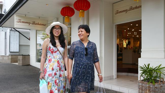 Chinese visitors to Cairns are spending more money than tourists from any other country. Qin Mei Yu and her mother Hong Yu are visiting Cairns for the first time, and buying goods which are much dearer in China. PICTURE: BRENDAN RADKE