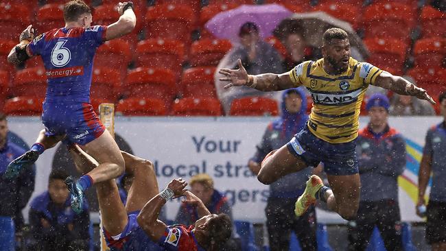 Parramatta’s Maika Sivo takes to the air against Newcastle at McDonald Jones Stadium. Picture: Getty Images