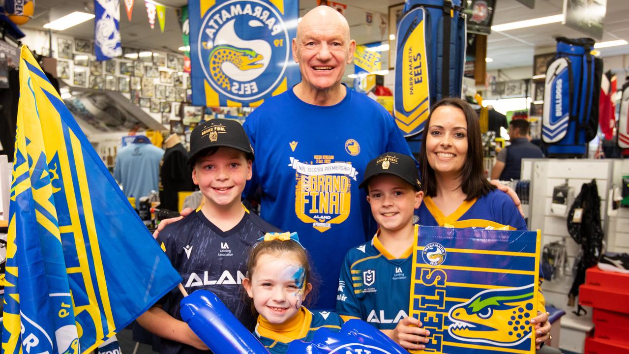 Peter Wynn with a new generation of Eels fans at his sports store in Parramatta. Picture: Brendan Read