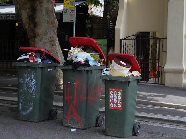 SYDNEY, AUSTRALIA - Newswire photos FEBUARY 08 2022: A view of bins out full of rubbish waiting to be emptied in Surry Hills as the waste workers strike continues leaving the streets of the city of Sydney overrun with rubbish. Picture: NCA Newswire / Gaye Gerard