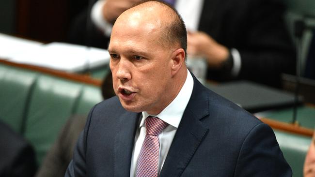 Minister for Home Affairs Peter Dutton during Question Time in the House of Representatives at Parliament House in Canberra, Wednesday, October 24, 2018. (AAP Image/Mick Tsikas) NO ARCHIVING