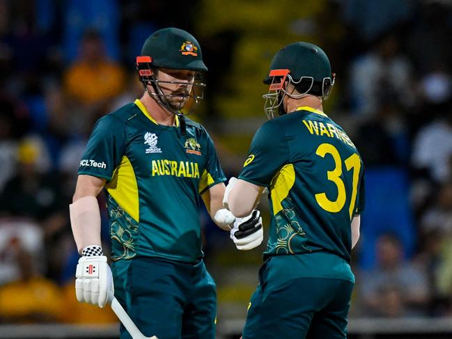 Travis Head (L) and David Warner (R) were quick to chase down Namibia’s score. Picture: Randy Brooks / AFP