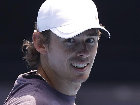 MELBOURNE, AUSTRALIA - JANUARY 10: Andrey Rublev (L) chats with Alex de Minaur of Australia during a practice session ahead of the 2025 Australian Open at Melbourne Park on January 10, 2025 in Melbourne, Australia. (Photo by Daniel Pockett/Getty Images)