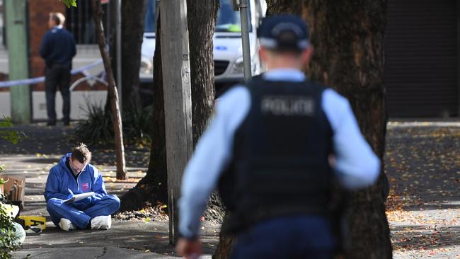 Police at the scene of the crime. Picture: Tracey Nearmy